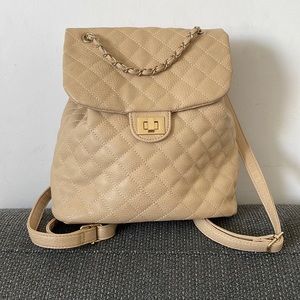 Quilted beige back pack purse